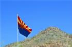 One of the many large hills in Glendale featuring the Arizona State Flag.