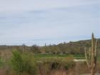 Inside the gated sanctuary of Quintero Golf and Country Club - view of golf course, custom lots and custom homes