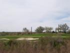 Inside the gated sanctuary of Quintero Golf and Country Club - view of golf course, custom lots and custom homes