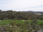 Inside the gated sanctuary of Quintero Golf and Country Club - view of golf course, custom lots and custom homes