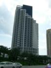 New highrises along the beach offer great views while blocking sun for local beachgoers.