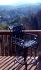 BEAVERDAM VALLEY. Asheville, N.C.  In danger of development, but still respected, the homes here are nestled into the mountainside. Chair with a view!
