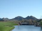 Sun City Festival Golf Course view with models in the background
