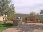One of the model homes at Monterey Court at Verrado Arizona - courtyard with fireplace and barbeque
