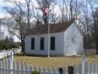 This is a one room school house that has been preserved by the Colts Neck Historical Society.  You can get information on today's schools by visiting http://www.ShowcaseRealty.com