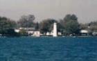 On the St.Clair River, Peche Island Lighthouse Proudly Announce " MARINE CITY"  Rescured from Demolition  8 21, 1983. 
      
      