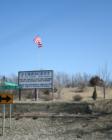 City sign at the intersection of Old Mormon Bridge Road and Old Lincoln Highway in Crescent Iowa.