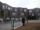 Picture of the back of the Townhomes.  Crownmolding, granite countertops, and other custom touches are standard with these units. 