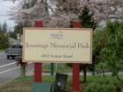 The entrance sign to Jennings Memorial Park off Armor Rd.