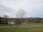 A view of the mountains and lake from the Lake Vista Pool on Lake Vista Drive, Forest