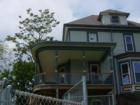 Grand Charm of a Wrap-A-Round Porch at 631 E. 7th Street owned by Lucky Lang
