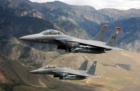 Strike Eagles in the Sawtooths.  Two F15Es of the 391st Fighter Squadron touring the Sawtooth mountain range north of Mountain Home.