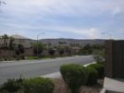 The entrance to the exclusive MacDonald Highlands.  Looking west from Stephanie 