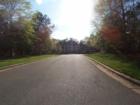 Wide tree lined streets are common at The Oaks.