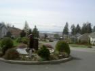 The fountain and Puget Sound, Priest Point, view from the cult-de-sac in Hawthorn Hill in Marysville Washington.