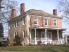 Brick house from 1804 built from clay bricks these were kneaded by cattle being driven over them.