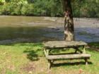 ASHEVILLE, N.C. Picnic Bench Awaits YOU as the French Broad River boldly flows.