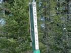 Clearly marked with green 4x4 with vertical sign marker on each side along Maine roadways.