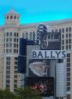 Bally's sign with Bellagio in background.