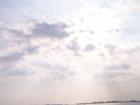 Sun through the clouds from the pier in southern Cape Coral.