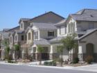 (Apple Creek)Sierra Ranch is located in North Las Vegas. White split rail fences line the common areas. There is a playground, soccer fields and picnic areas. Many floorplans are available from small to large.  