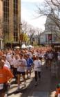 Crazy Legs - a Madison Institution - '99 race on State.  What's in the background?
      (Photo by Jim Witkins)