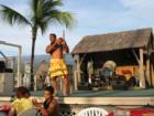 Coconut opening at Island Breeze Luau at King Kamehameha's Kona Beach Hotel 
