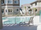 Cool off from the desert sun in the pool area at Aspen Peak Condominiums in Henderson, NV.