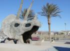 A giant dinosaur head at Nature Discovery Park provides an imaginative play area for children in North Las Vegas, NV.
