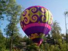 Stowe Vermont - July Hot Air Balloon Festival - this balloon landed in the parking area of condos part way up a hill - gorgeous colors.