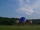 Stowe Vermont - beautiful hot air balloons gently touching down on the golf course right in the center of Stowe.