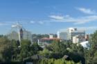 A scenic view of the downtown area and Riverfront Park in Spokane Washington