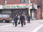 Hasidic Jewish kids crossing the street on 16th Avenue Borough Park, Brooklyn.