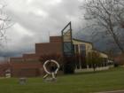 O'Fallon Library on a dark cloudy day.