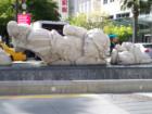 One of the sculptures seen while exiting the theatre called "How Are We Giving."