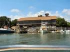 Looking at the restaurants in Murrells Inlet, SC from a boat.