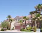 Palm and mesquite trees provide shade for homes in the Tuscany Hills section of Peccole Ranch in Las Vegas, NV.