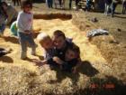 Kids play in the "corn box" at the Phillipsburg, MO Fall Festival (October 2006)