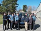 More members of the police department with the Red Sox World Series Championship trophy