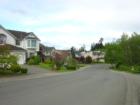 The streets of Winchester Hills are wide and have sidewalks, a feature of the more recent developments in Woodinville.