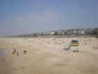 a view from the pier of the homes lined up in Manhattan Beach's "sand section"