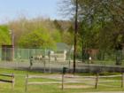 On nice days there is a waiting line for the tennis courts on each side of market street in the town park in Bloomsburg, PA