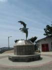 Dolphins downtown Cayucos in front of the pier and beautiful beach!