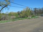 Oxbow Lake Rd, bridge over Huron River view to west upstream of bridge. No closer view workers in way.