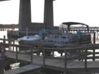 Boats docked under the Port Orange bridge