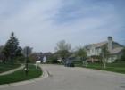 Centennial Farms, soft curving tree lined streets. 