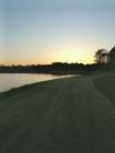 Sunset across Lake Trace on the 14th hole of the Lake Golf Course at Carolina Trace
