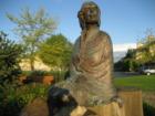 Statue On Rive Walking Path