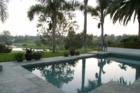 The No Fear Estate in La Costa offers the best of both worlds: A golf and lake view from an exquisite pool overlooking the course.