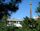 Bellagio pedestrian bridge with Paris Hotel in background.  May 2007